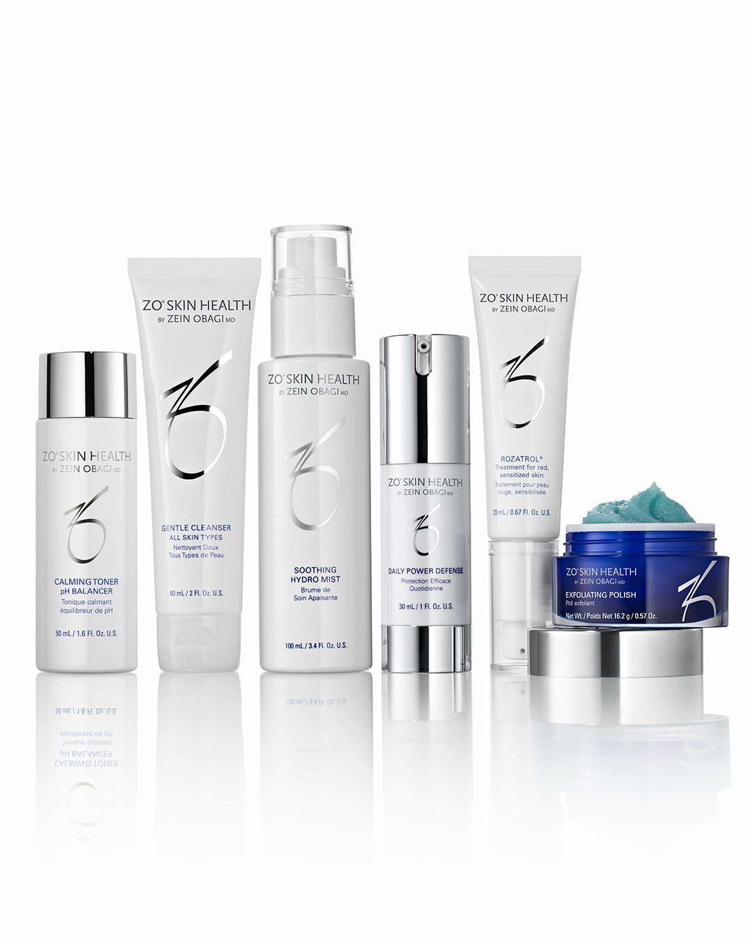 Six produits de soins de la peau ZO Skin Health sont présentés verticalement sur un fond blanc à la Clinique médico-esthétique Viva, notamment un tonique, un nettoyant, une crème hydratante, un vernis et des sérums dans des bouteilles blanches et argentées élégantes avec des accents bleus sur le pot de vernis.